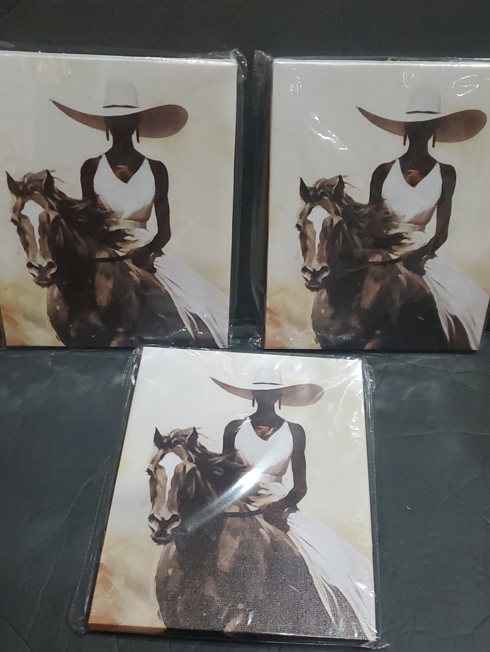 3pack wall art canvas of dark skin woman in wide brim cowboy hat on a wildhorse